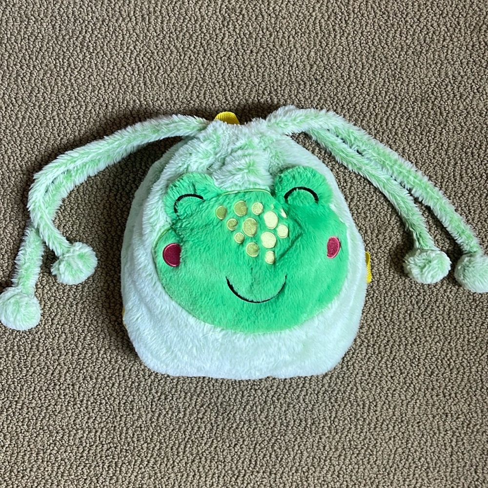 Frog backpack blanket. Very cute and soft.